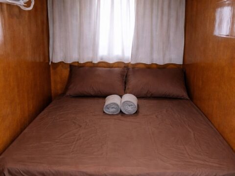 KLM Nur Amira — Private room — double bed with AC and towel